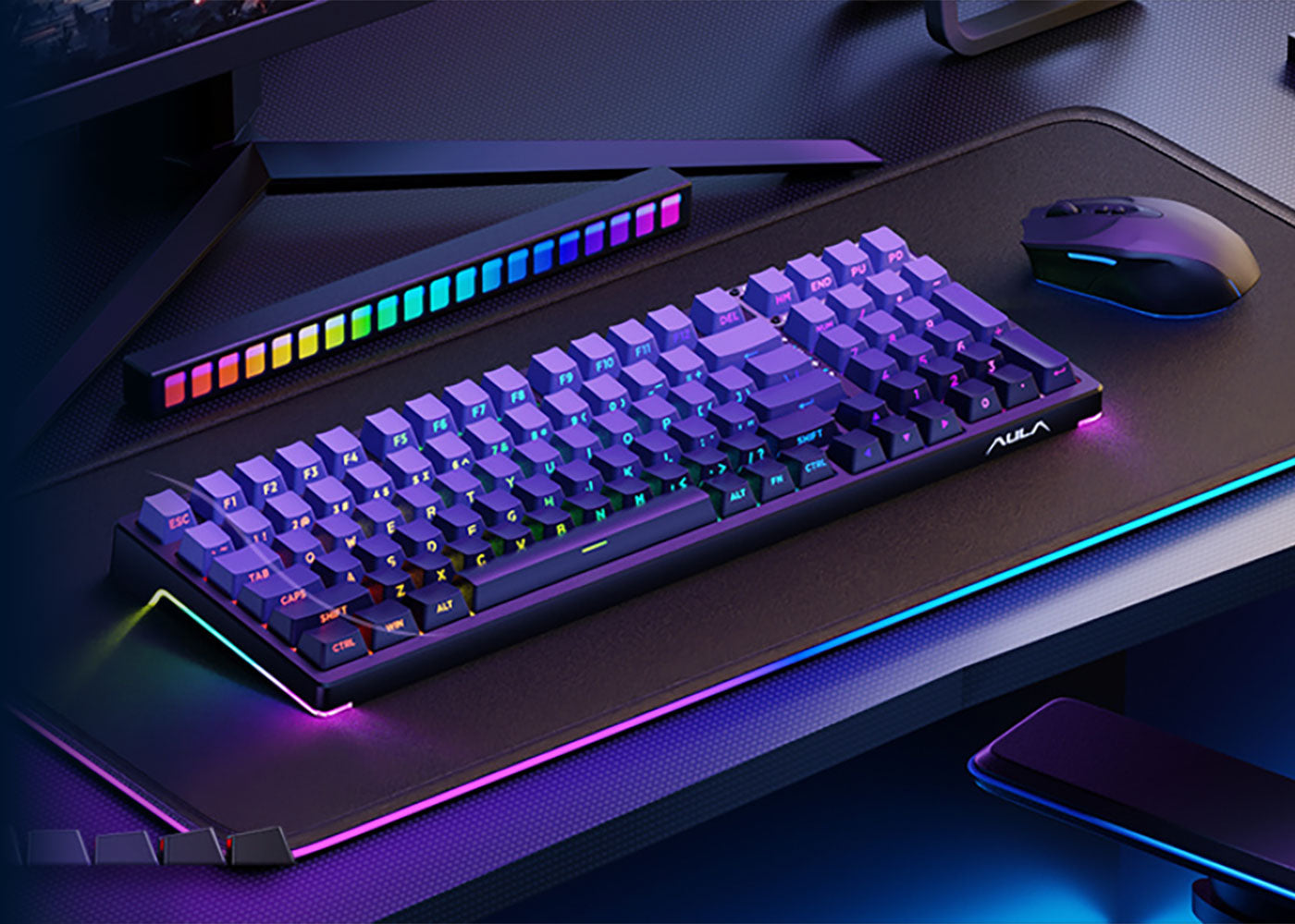AULA F98 mechanical keyboard with compact 98% layout, deep purple and blue RGB backlighting, and matching gaming accessories on a desktop setup.