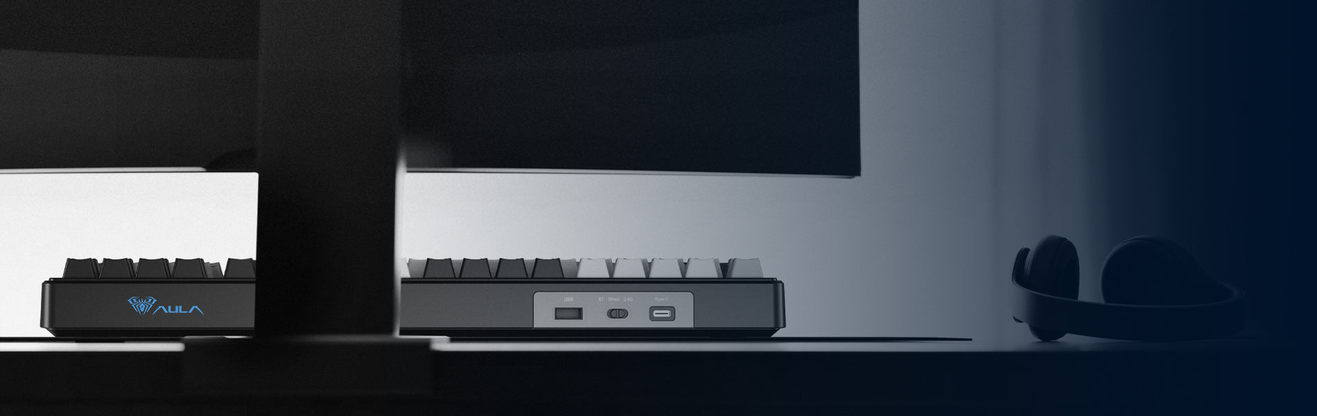 Dark view of AULA mechanical keyboard under a monitor, representing product quality or warranty.