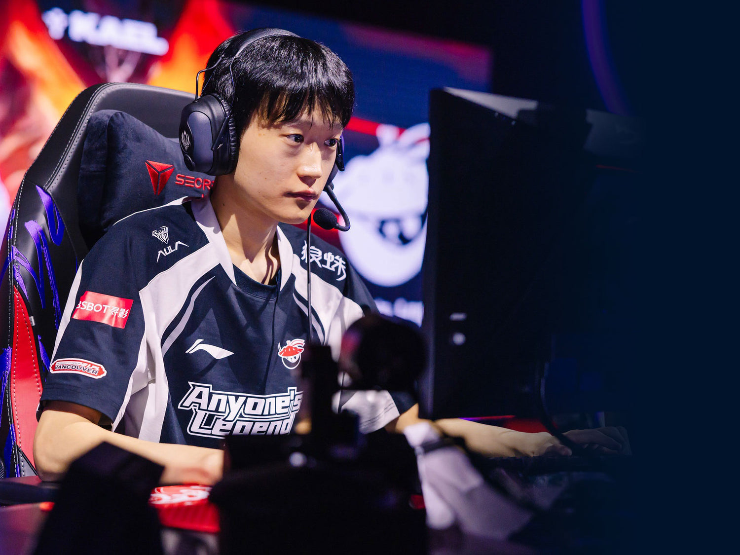 Shanks from AG.AL esports team playing at his gaming setup during a professional match.